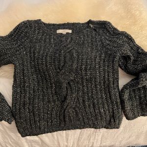 Charcoal, gray short, ribbed sweater with zipper at the neck short
